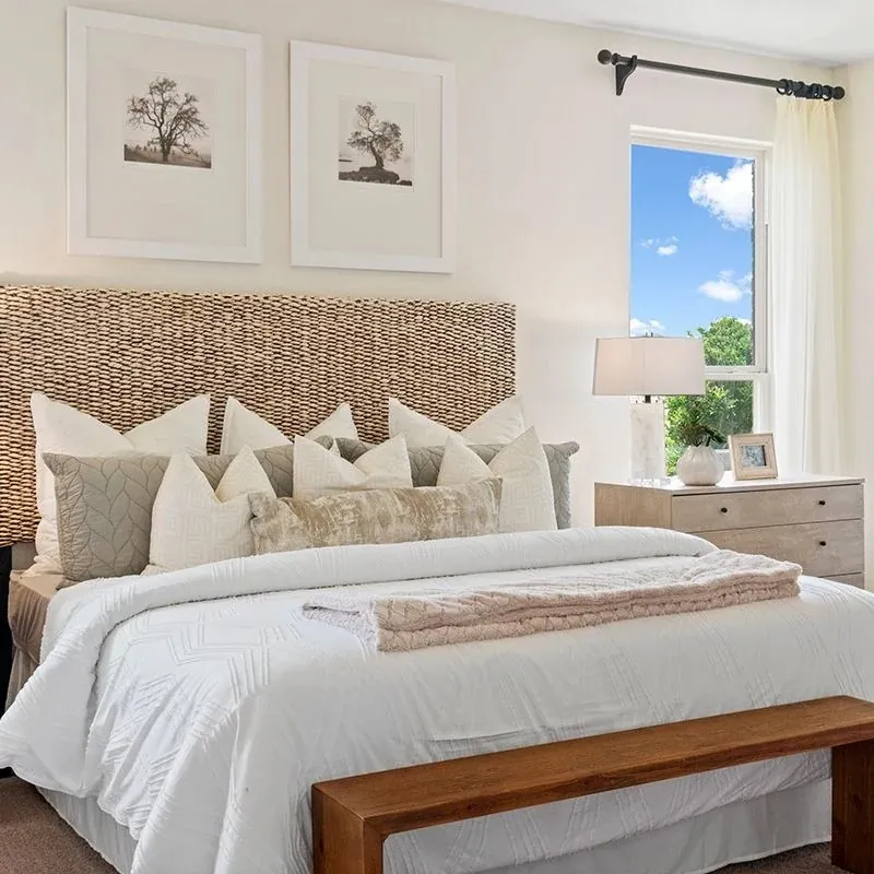 Bedroom with woven headboard