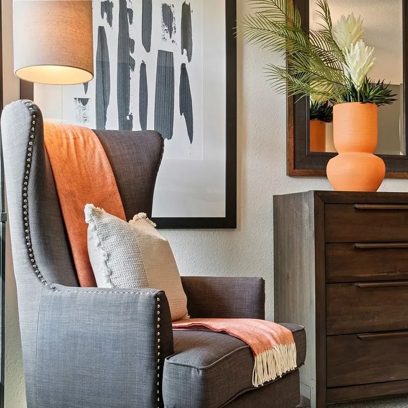 Study nook with armchair and dresser