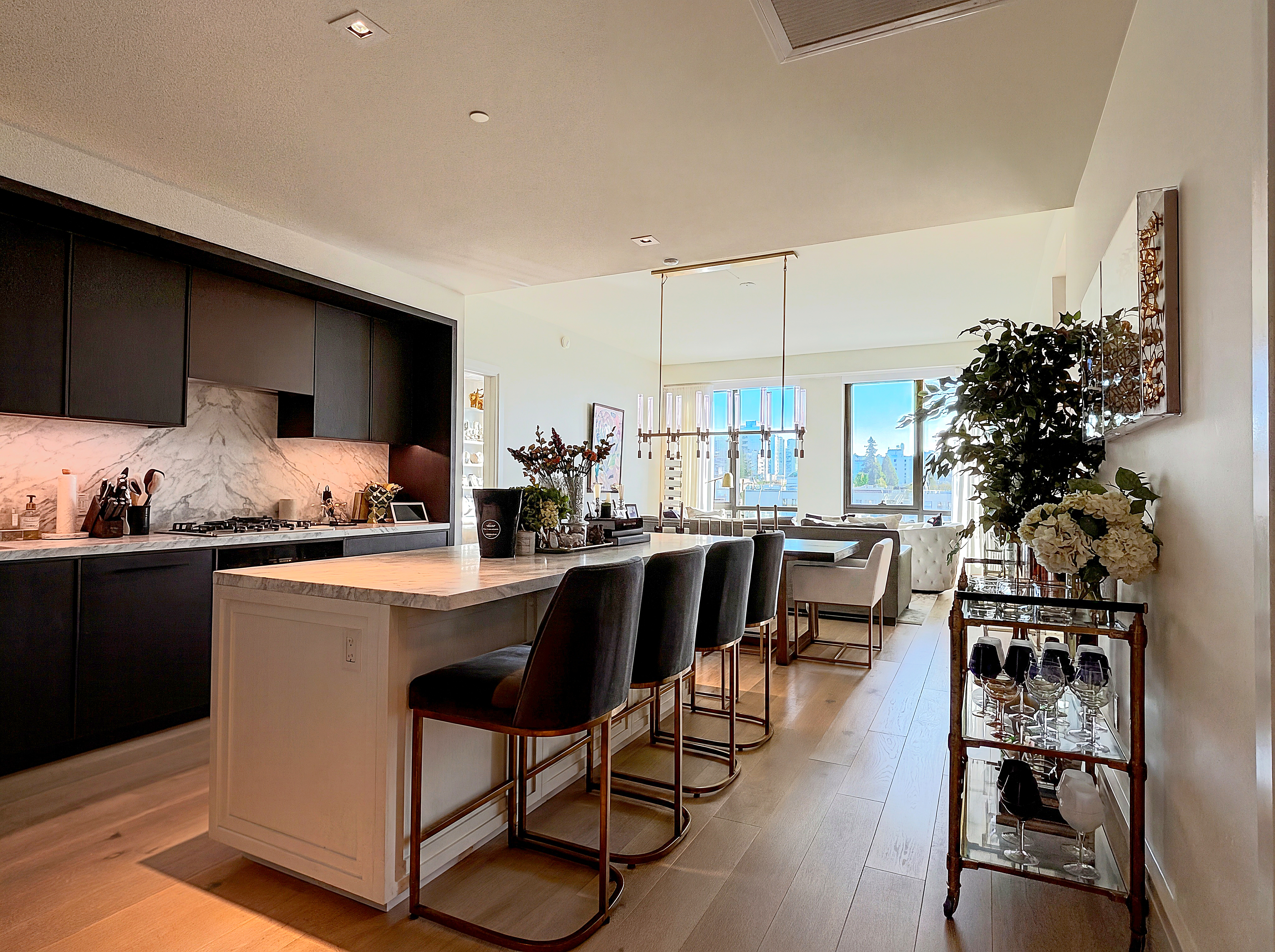 Open kitchen and dining with bar seating