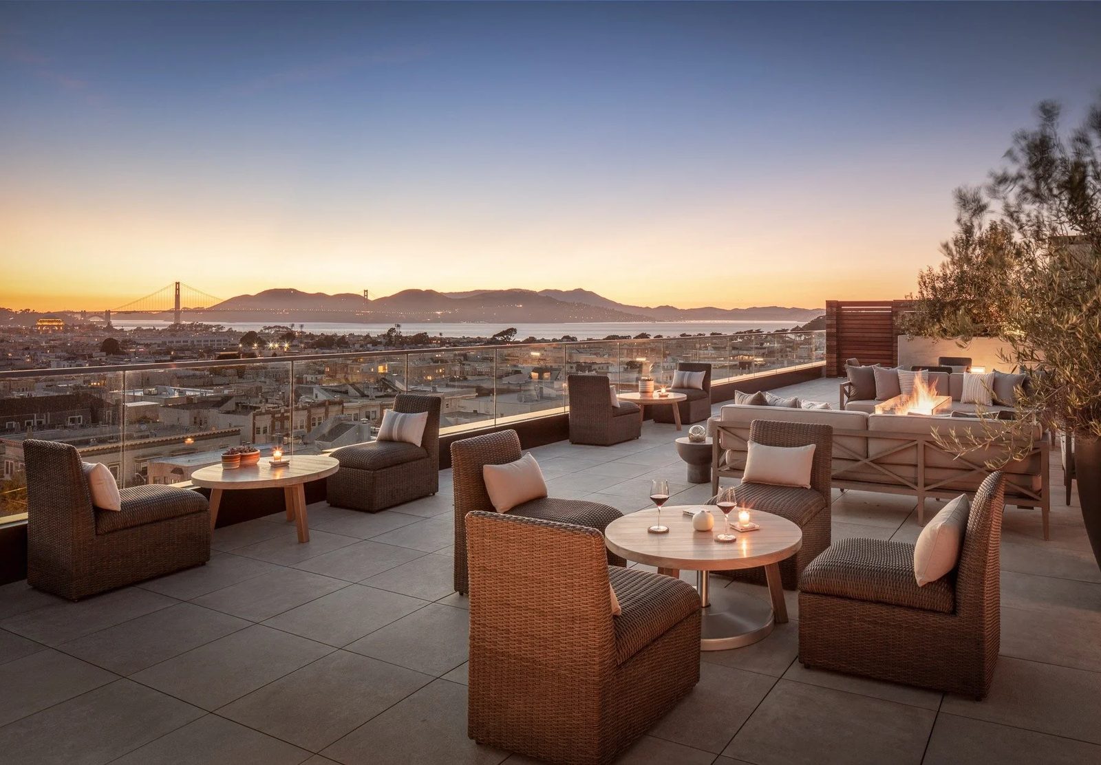 Rooftop terrace with Golden Gate at dusk